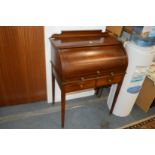 An Edwardian inlaid mahogany cylinder bureau.