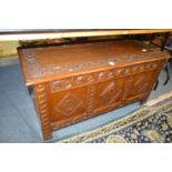 A carved oak coffer.