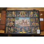 A coloured, embossed leather Egyptian revival photograph album.