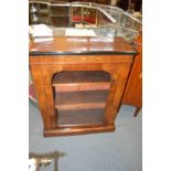 A Victorian inlaid walnut pier cabinet.