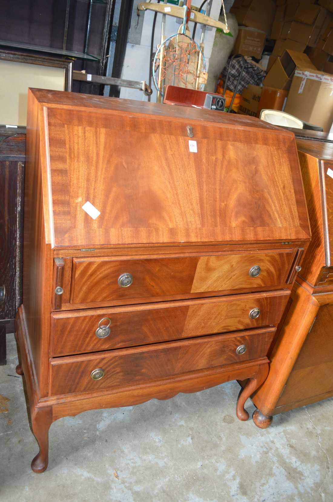 A mahogany bureau.