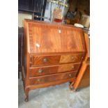 A mahogany bureau.