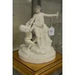 A Parian ware group of two playful children on a gilt wood base.