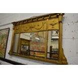 A Regency gilt framed over mantle mirror.