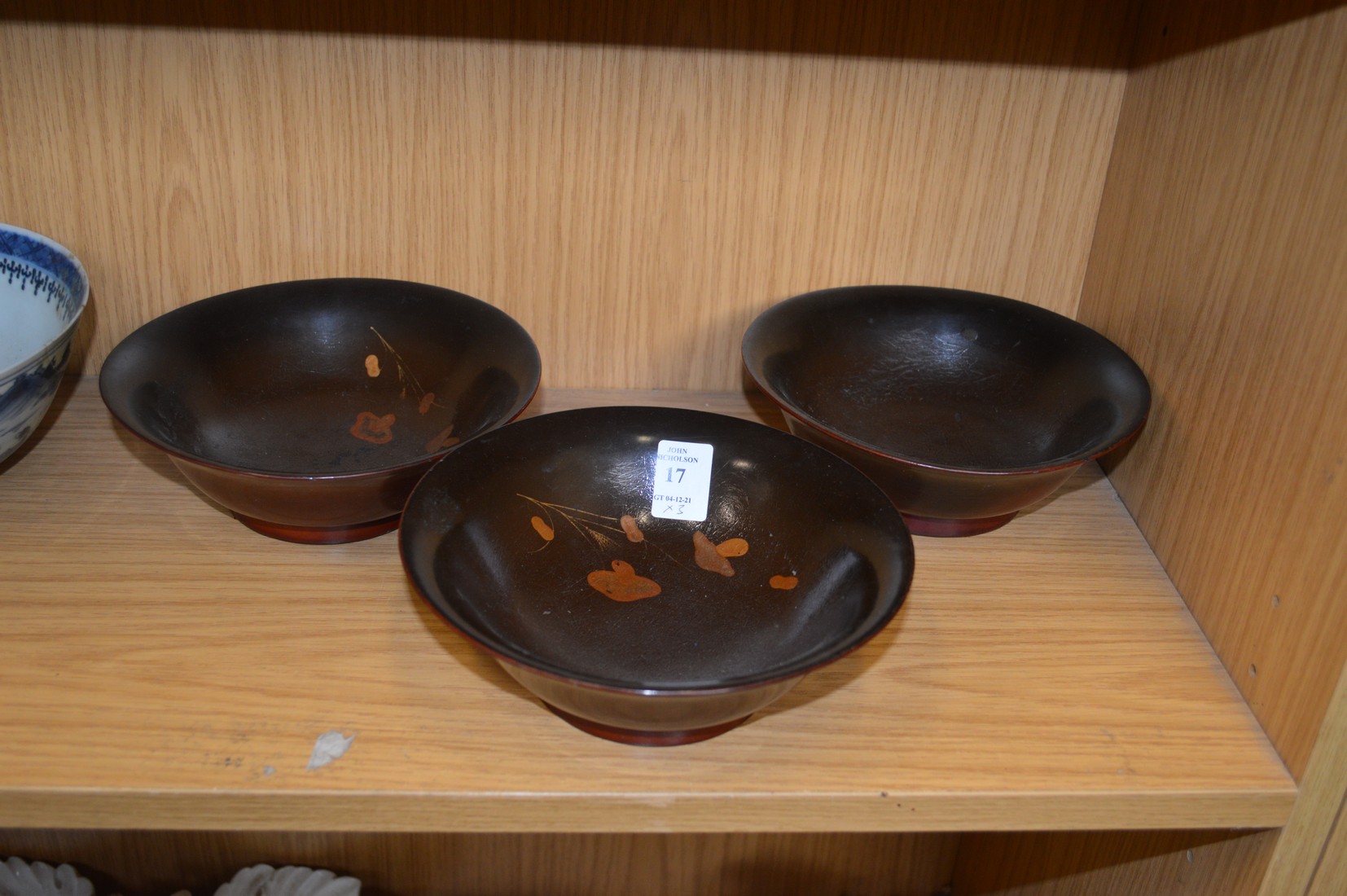 Three lacquer bowls.