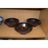 Three lacquer bowls.