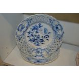 A pair of Meissen blue and white small plates with pierced borders.