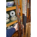 Various fishing rods and part rods.