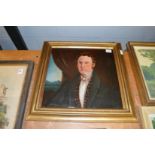 A bust length portrait of a young gentleman wearing a dark blue coat, oil on board.