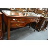 A yew wood bow fronted dressing table.