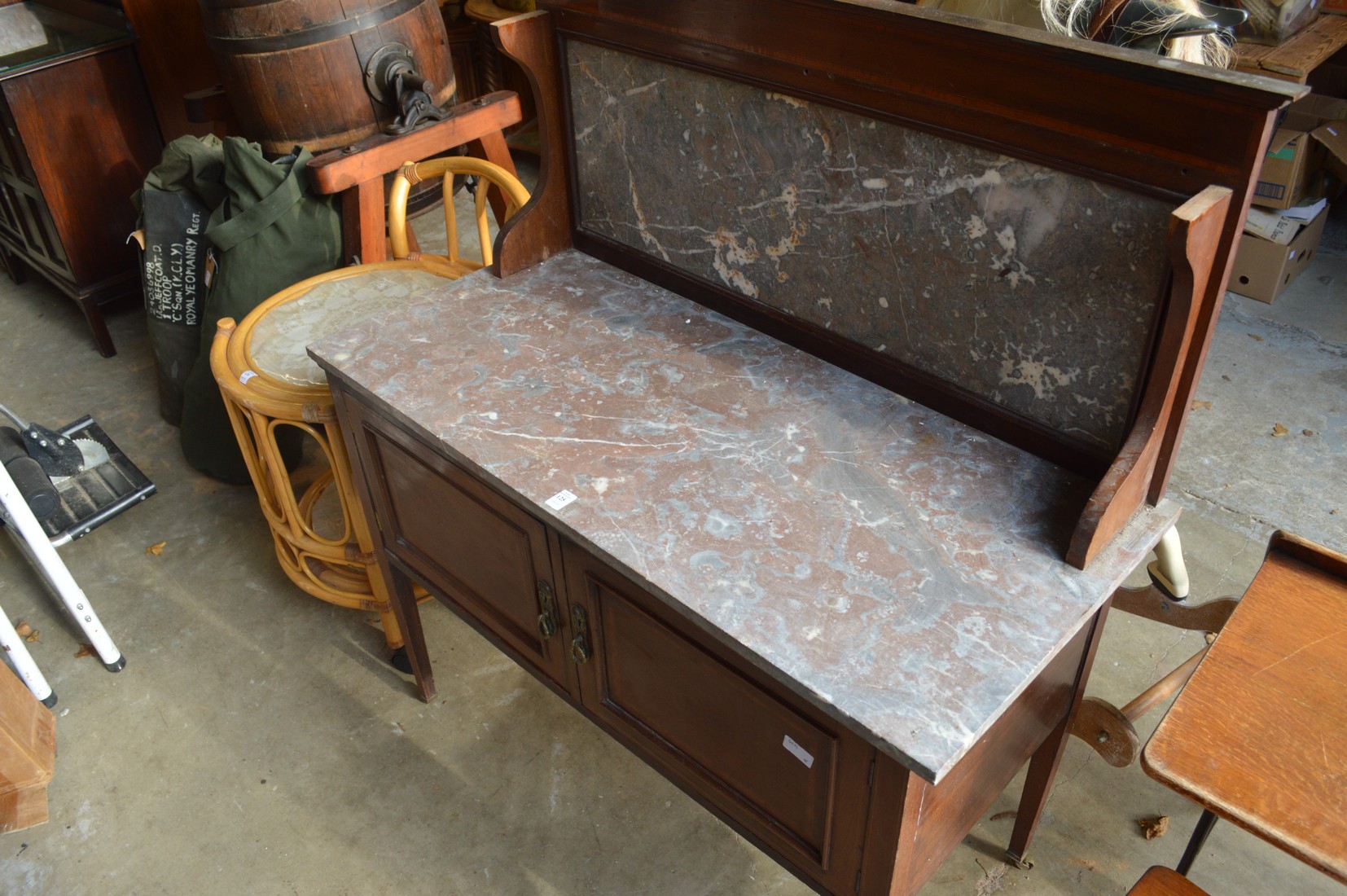 An Edwardian marble topped wash stand.
