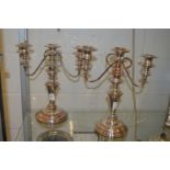 A pair of Old Sheffield Plate three light twin branch candelabra.