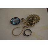 A silver ring and a decorative brooch etc.