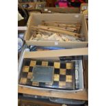 A lacquer folding chess box and various other games, wind chimes etc.