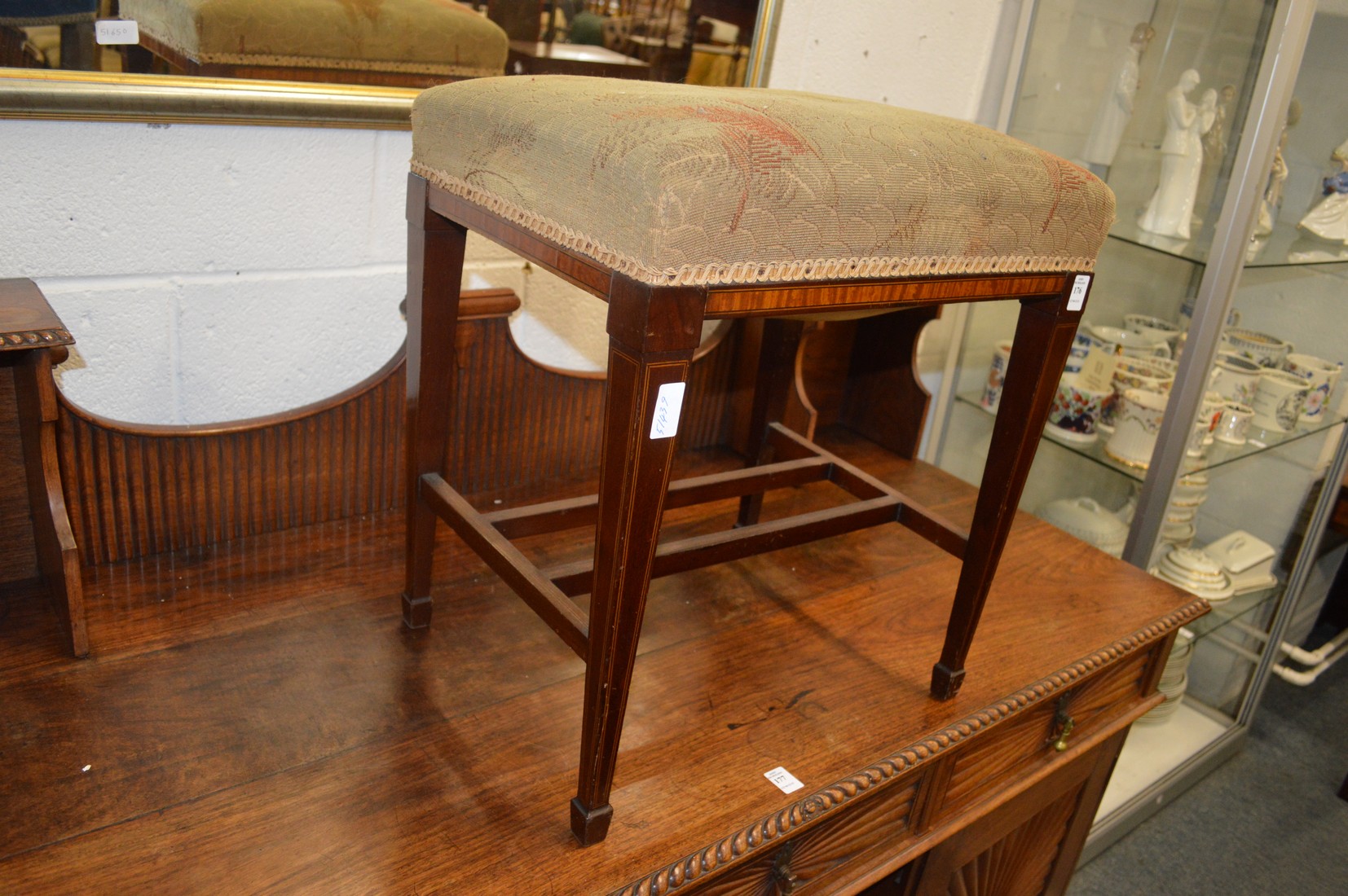 A good Edwardian inlaid mahogany stool.