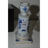 A Meissen blue and white candlestick.