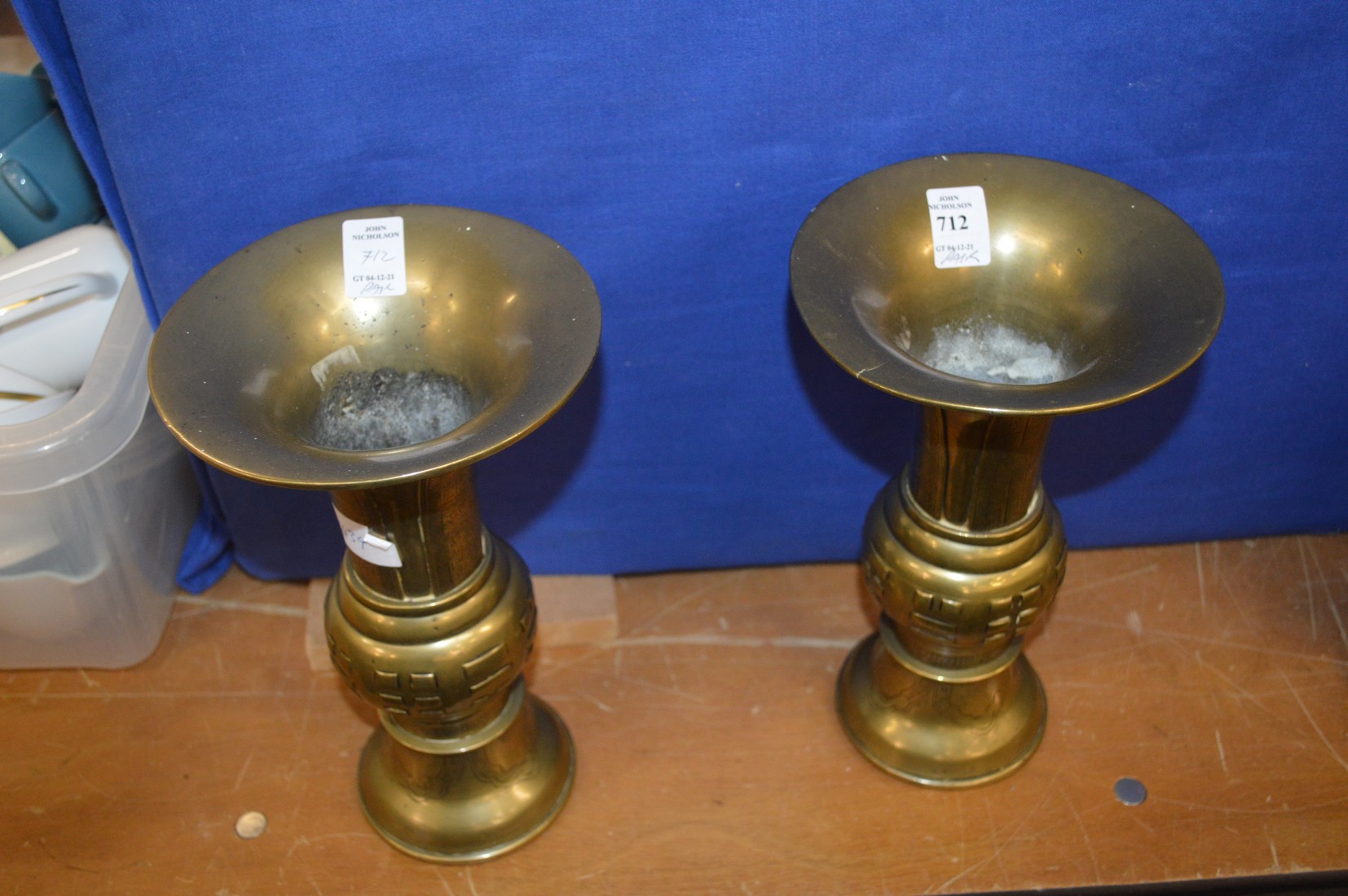 A pair of Chinese Gu shaped brass vases.