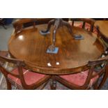A good Regency rosewood circular tilt top breakfast table on turned column support with four