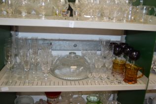 Two shelves of glassware.