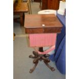 A 19th century mahogany sewing table, possibly Isle of Man, with unusual carved base.