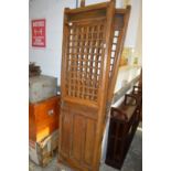 A pair of eastern hardwood lattice doors.