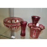 A good cut glass and ruby tinted bowl and three similar items.