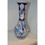 An Iznik style pottery vase.