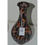 A Chinese bottle vase with mottled glazed decoration.
