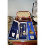 A leather cased silver christening set and three other items.