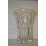 A large cut glass vase.