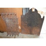 A cast iron fire back and a grate.