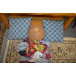 Ladies' head scarves, a pair of cushions and a sewing basket.