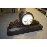 A Victorian slate mantle clock.