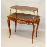 A GOOD LOUIS XVI STYLE TWO-TIER TABLE, with chequered inlay and ormolu mounts, carrying handles to
