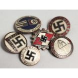 SIX REPLICA NAZI BADGES.