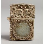 A CHINESE GILT METAL AND JADE LIGHTER.