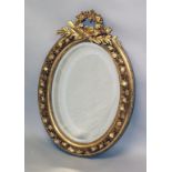 A GOOD FRENCH STYLE GILTWOOD OVAL MIRROR. 3ft 2ins x 2ft.