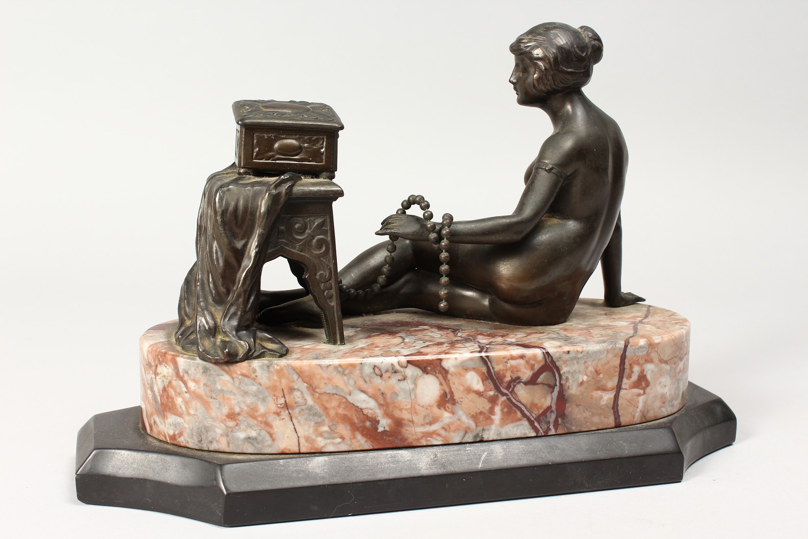 A BRONZE DECO NUDE on a marble base. 10ins long. - Image 4 of 5