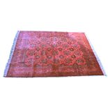 A GOOD PERSIAN CARPET, red ground with a design of large floral palmettes, within a similar