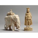 TWO EUROPEAN CARVED IVORY CHESS PIECES, king and rook. King stands 10.5cms tall (2). (AF).