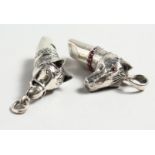 TWO CAST SILVER NOVELTY HORSE'S HEAD WHISTLES.