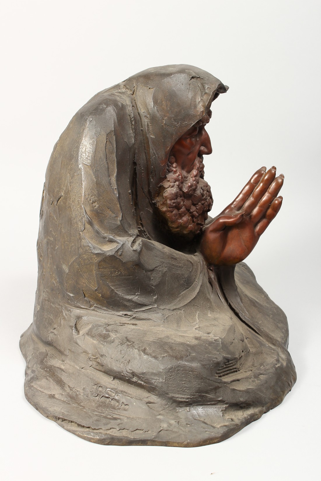 A BRONZE FIGURE OF A MAN meditating. 17ins long. - Image 3 of 4