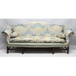 A LARGE GEORGE III DESIGN MAHOGANY SOFA, early 20th century, with a hump back, scroll end, on carved