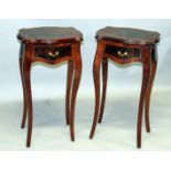 A PAIR OF FRENCH STYLE BEDSIDE TABLES with crossbanded tops, single drawer, on curving legs. 2ft