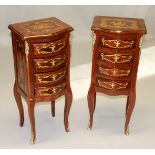 A PAIR OF SERPENTINE FRONTED INLAID BEDSIDE CABINET with three drawers, on curving legs. 2ft 7ins