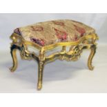 A LARGE LOUIS XVI DESIGN STOOL with padded top and giltwood frame. 3ft 6ins x 3ft x 3ft 8ins.