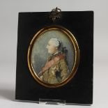 A FRAMED OVAL PORTRAIT OF, POSSIBLY, GEORGE IV. Watercolour. 3.5ins x 2.75ins.