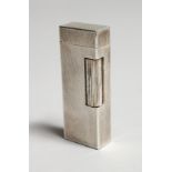 A MANS SILVER DUNHILL LIGHTER, Swiss made.