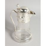 A CLARET JUG with plate mounts and engraved with anthemion.