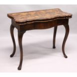 AN 18TH CENTURY ITALIAN FIGURED WALNUT FOLD-OVER CARD / TEA TABLE, of serpentine outline, with a